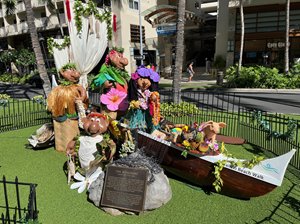 Menehune statues newly decorated in celebratory garb