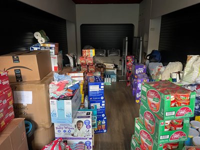 Room filled with boxes of nonperishable donations