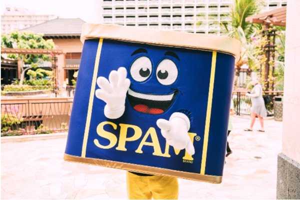 SPAMMY mascot resembling a smiling SPAM can