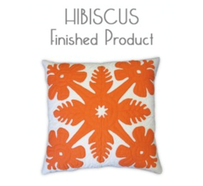 White quilt pillow with orange hibiscus pattern that you can sew yourself