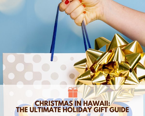 Hand holding a gift bag with a gold bow on the right corner with the words "Christmas in Hawaii: The Ultimate Holiday Gift Guide" underneath